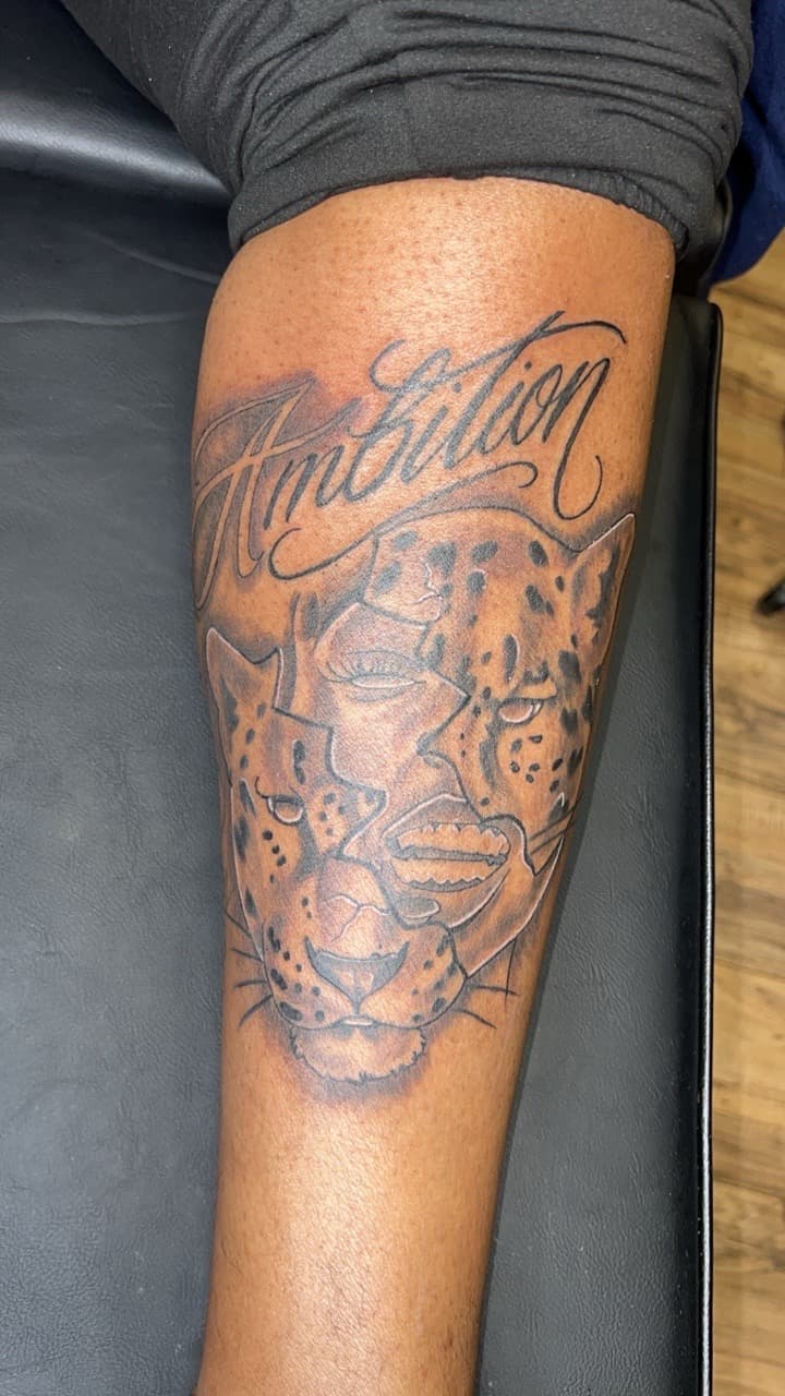 Black & Grey + Illustrative leopard tattoo on Calf by Jay on TattMe