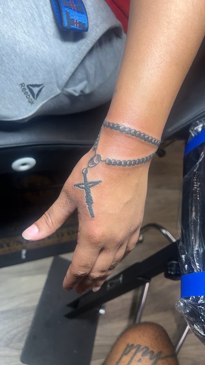 Black & Grey + Fine Line rosary tattoo on Hand by Jay on TattMe
