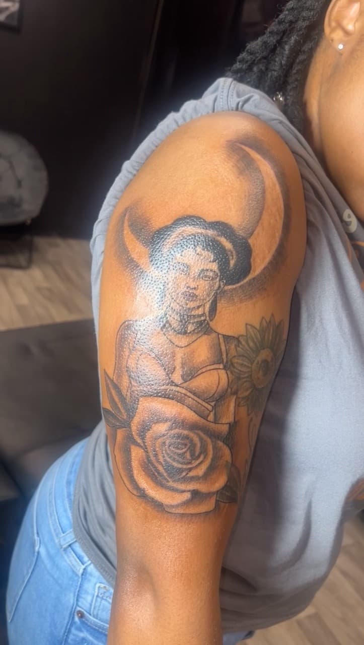 Black & Grey + Illustrative woman tattoo on Upper Arm by Jay on TattMe
