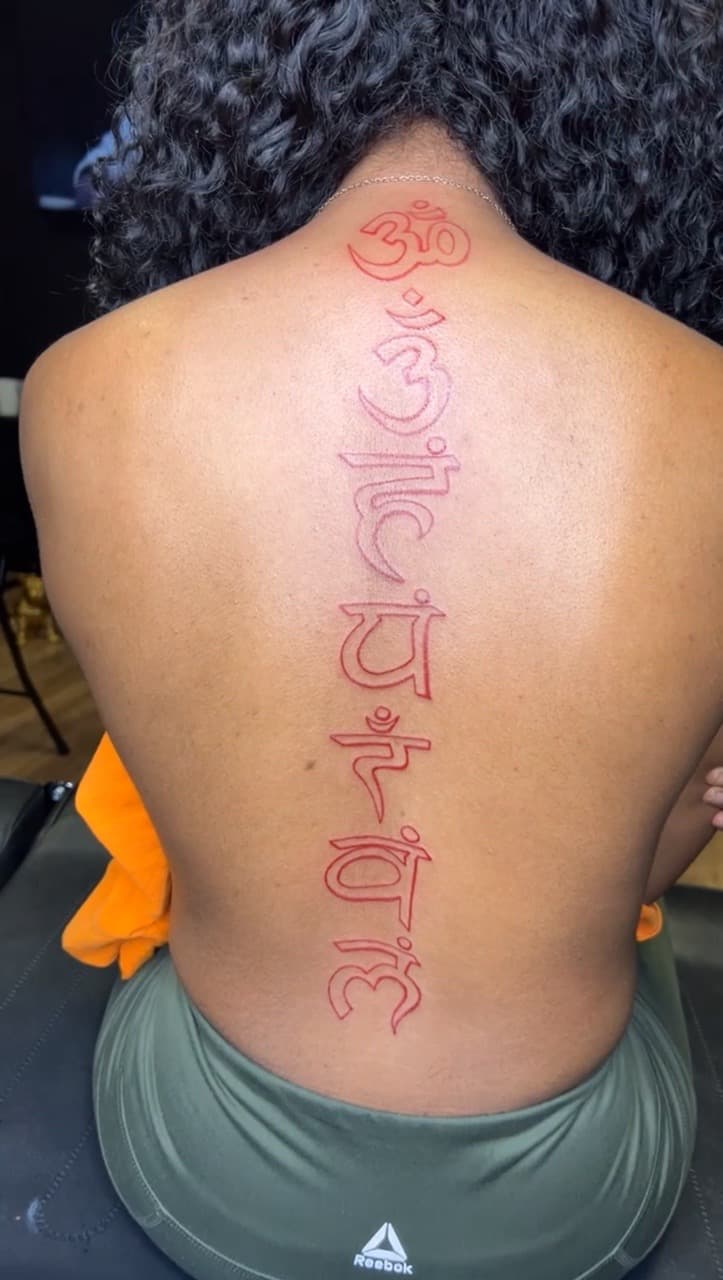 Line-work + Lettering symbols tattoo on Spine by Jay on TattMe