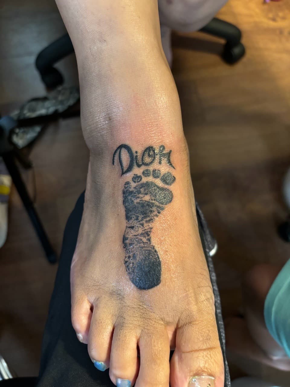 Black & Grey + Lettering footprint tattoo on Foot by Malik_Coates on TattMe
