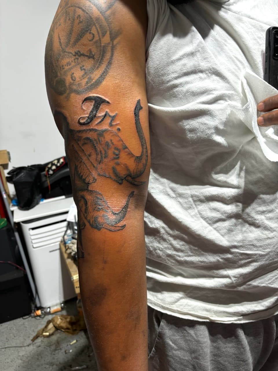 Black & Grey + Illustrative elephants tattoo on Upper Arm by Malik_Coates on TattMe