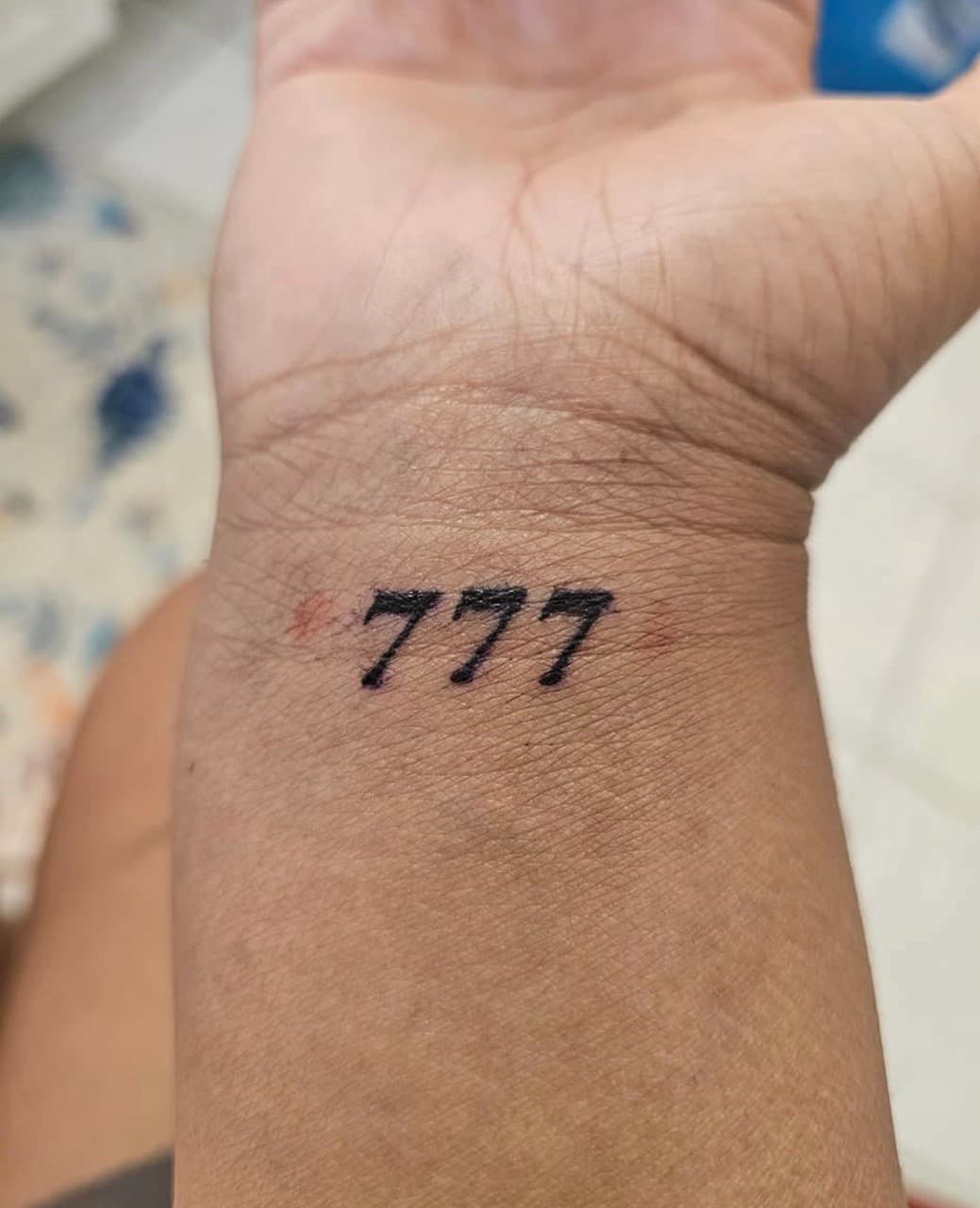 Lettering + Script numbers tattoo on Wrist by Malik_Coates on TattMe