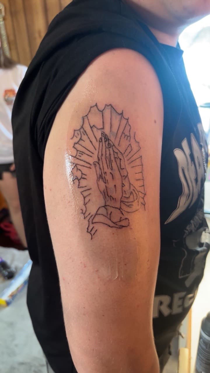 Line-work + Black-work praying hands tattoo on Upper Arm by Gages_works_1 on TattMe