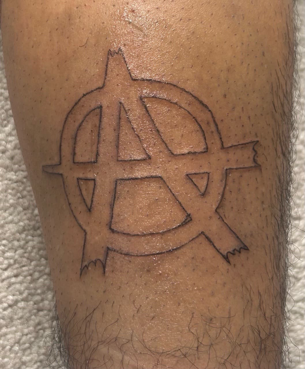 Line-work + Minimalist anarchy symbol tattoo on Calf by b13nk on TattMe