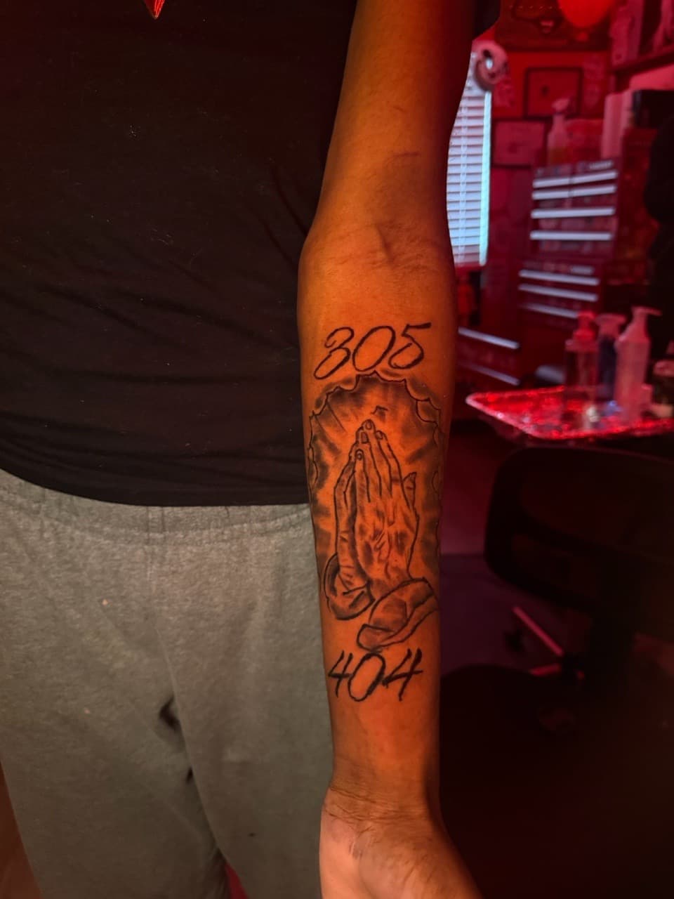 Black & Grey + Lettering praying hands tattoo on Forearm by Inkbyjmoney on TattMe