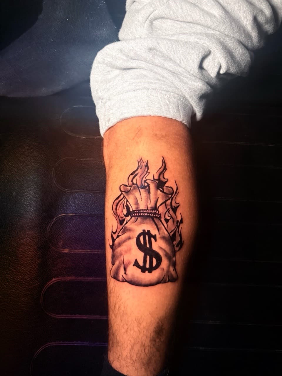 Black & Grey + Illustrative money bag tattoo on Calf by Inkbyjmoney on TattMe