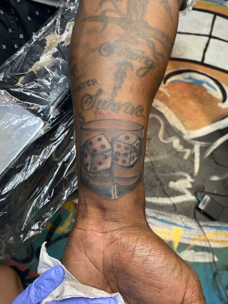 Black & Grey + Illustrative dice tattoo on Forearm by The_Supplier_Tattoo on TattMe