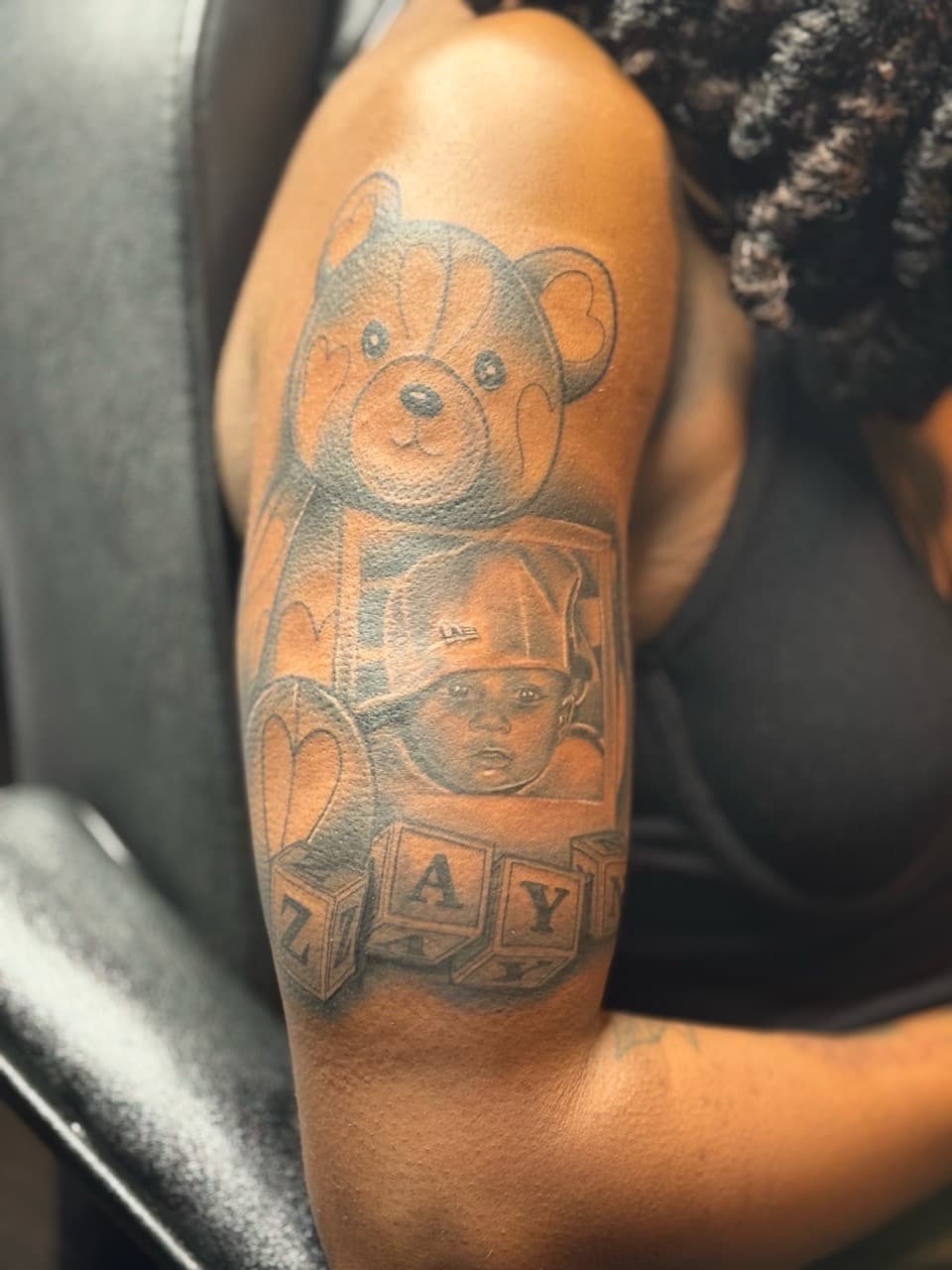 Black & Grey + Realism teddy bear tattoo on Upper Arm by Juu on TattMe