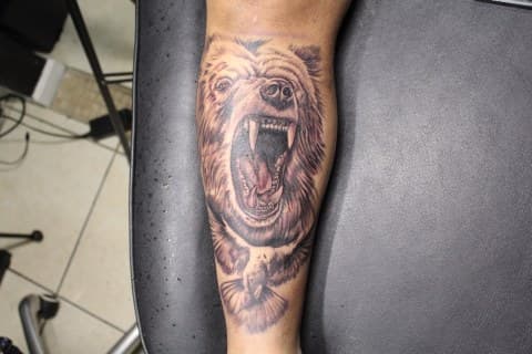 Realism + Black & Grey bear tattoo on Calf by Juu on TattMe