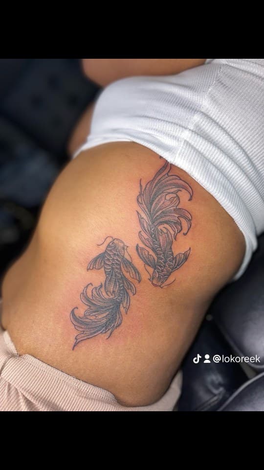 Black & Grey + Japanese koi fish tattoo on Ribs by Juu on TattMe