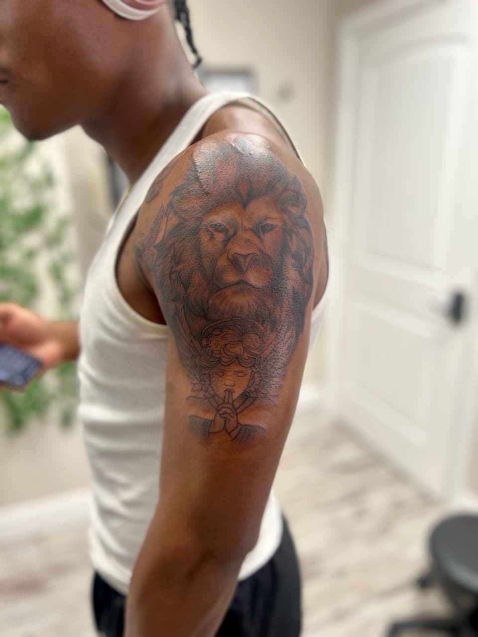 Black & Grey + Realism lion tattoo on Upper Arm by Babygirl_Ink on TattMe