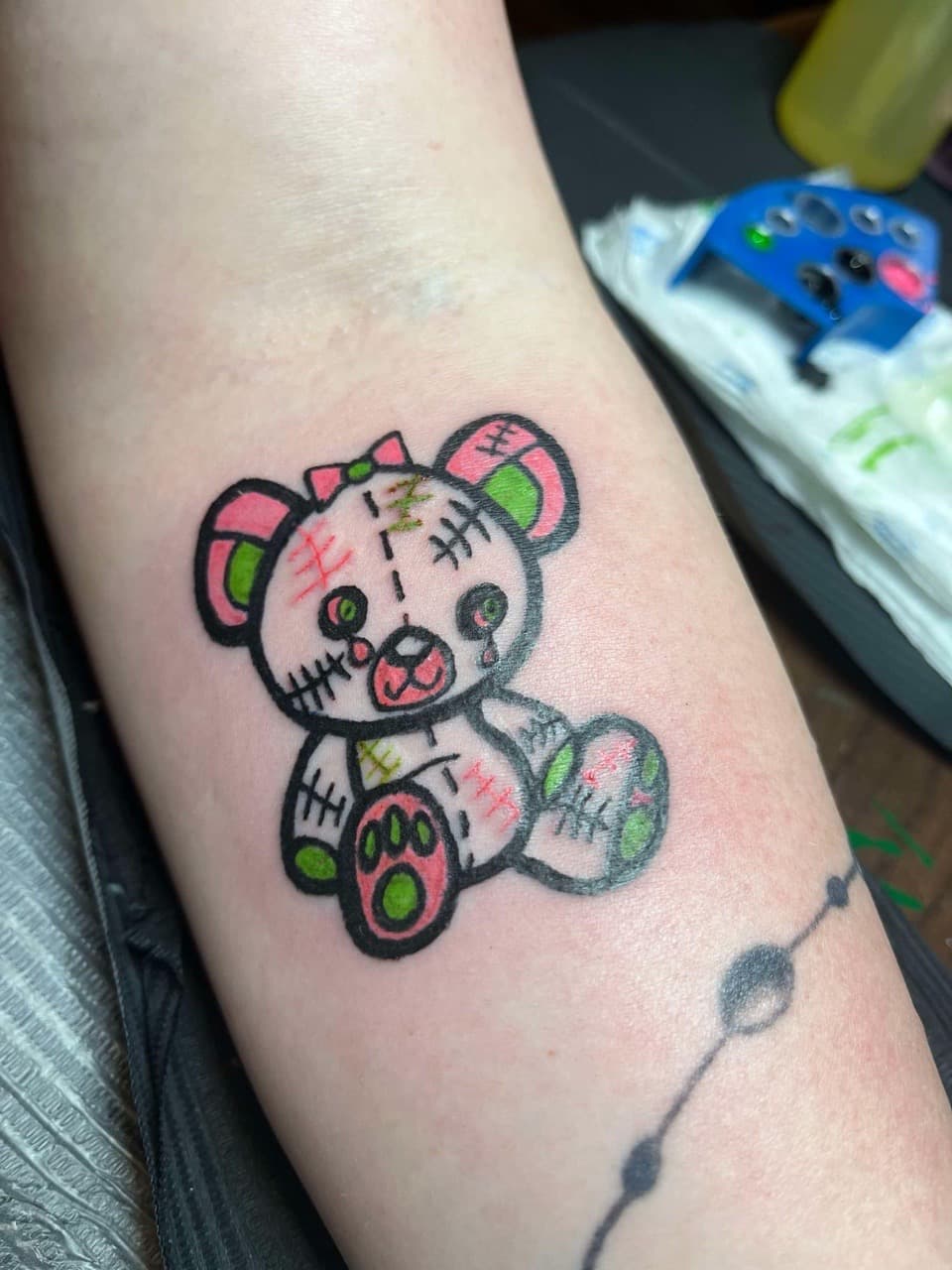 Cartoon + Color teddy bear tattoo on Forearm by ink_queens_VICTORIA on TattMe