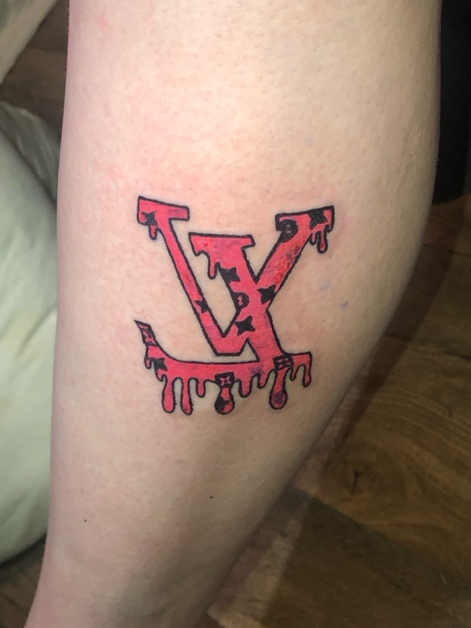 Pop Culture + Color louis vuitton tattoo on Calf by ink_queens_VICTORIA on TattMe