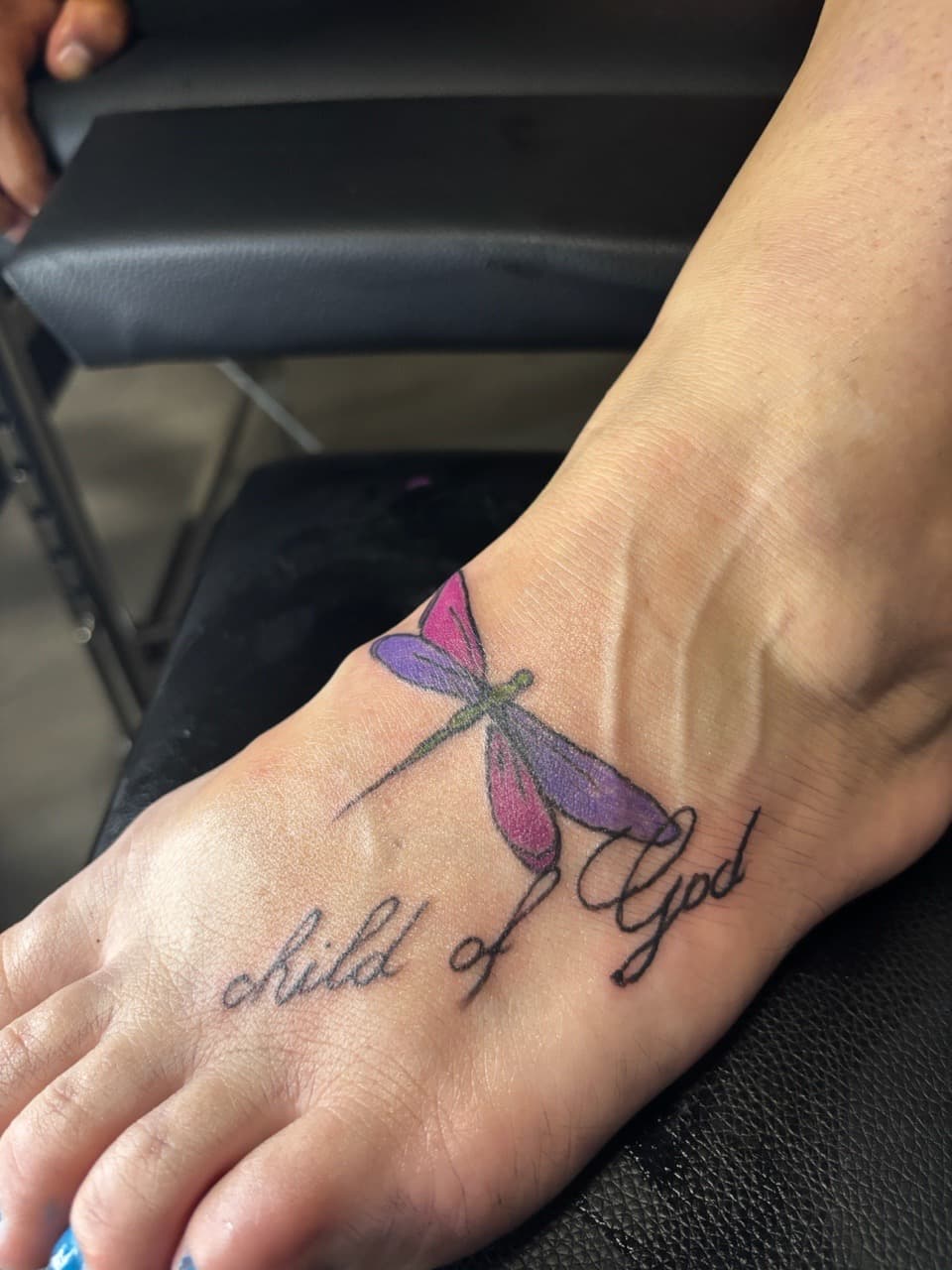 Lettering + Script dragonfly tattoo on Foot by Mr_I_Can_Do_Tattoos on TattMe