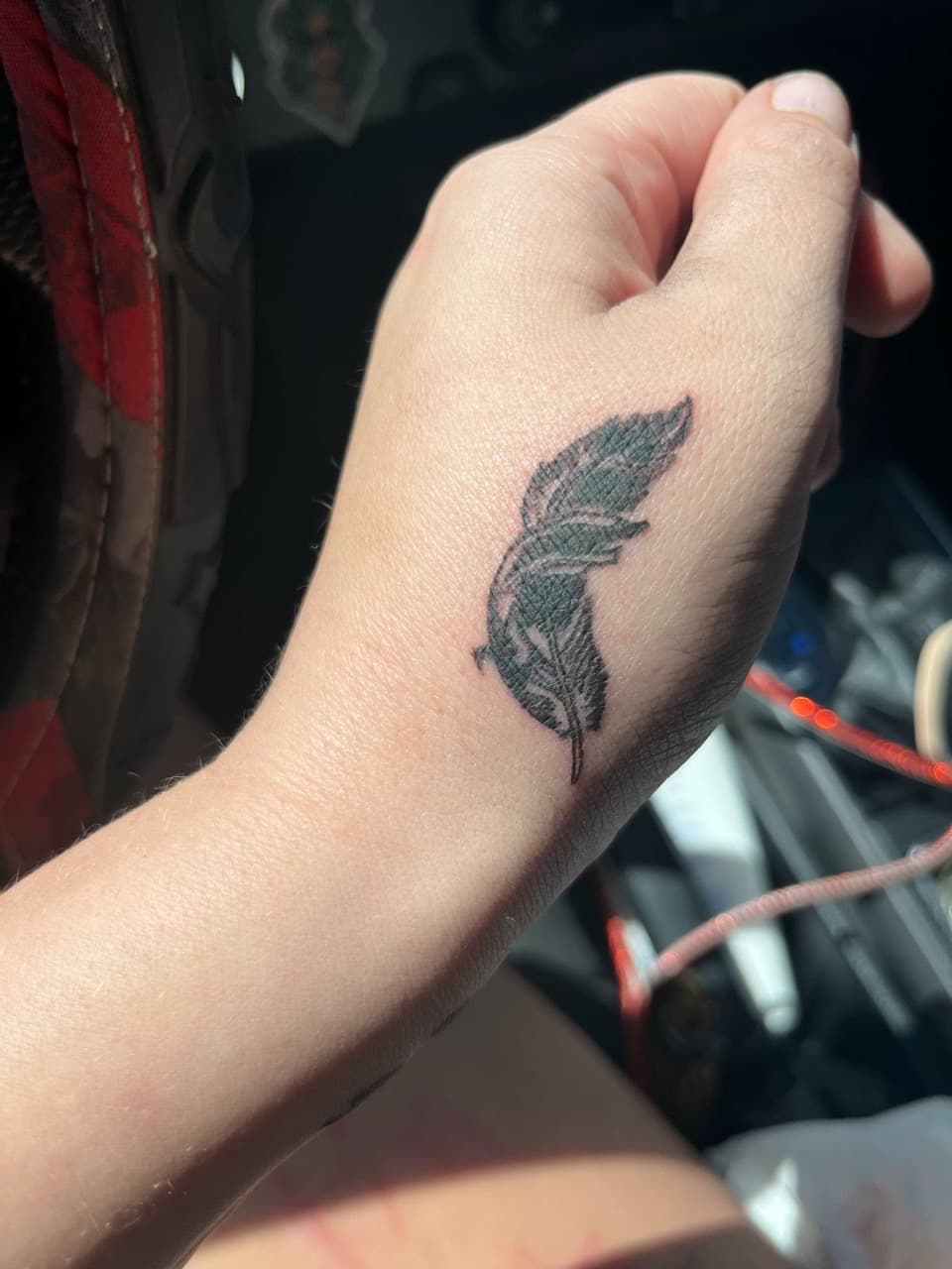 Black & Grey + Illustrative feather tattoo on Hand by Mr_I_Can_Do_Tattoos on TattMe