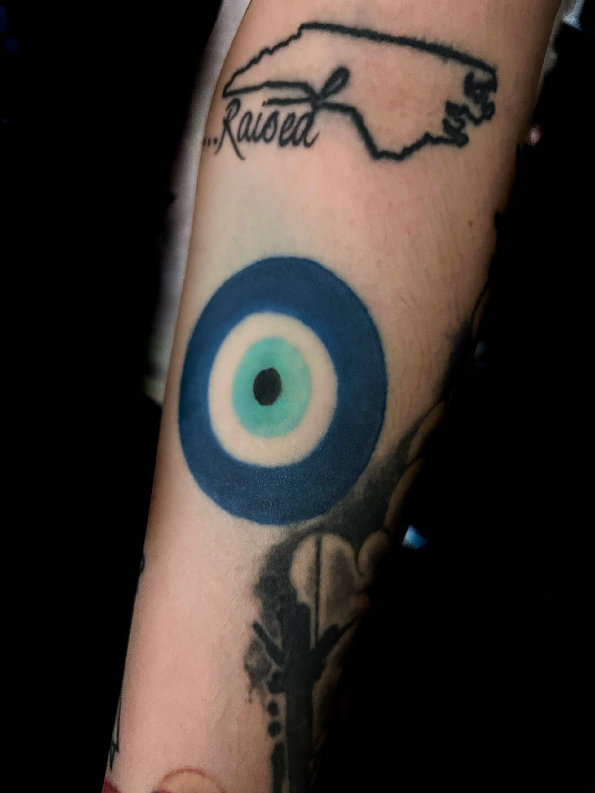 Color + Symbolic evil eye tattoo on Forearm by Sierato_Tattoos on TattMe