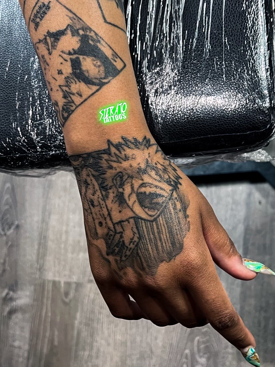 Black & Grey + Illustrative lion tattoo on Hand by Sierato_Tattoos on TattMe