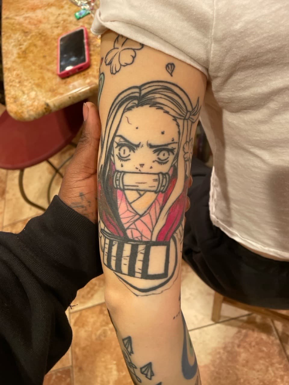 Anime + Illustrative anime character tattoo on Upper Arm by Sierato_Tattoos on TattMe