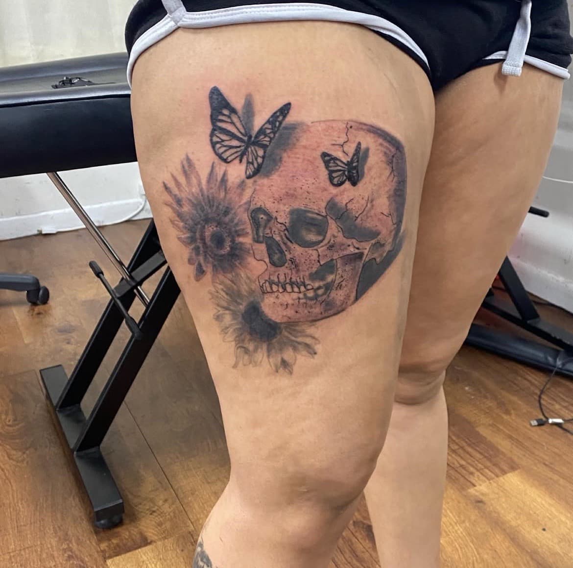 Black & Grey + Illustrative skull tattoo on Thigh by Titan_Ink on TattMe