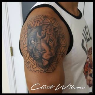 Black & Grey + Realism jaguar tattoo on Upper Arm by Clint_Wilson on TattMe
