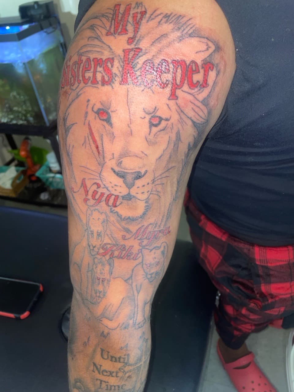 Black & Grey + Lettering lion tattoo on Upper Arm by 4oeMag_Tattoos on TattMe