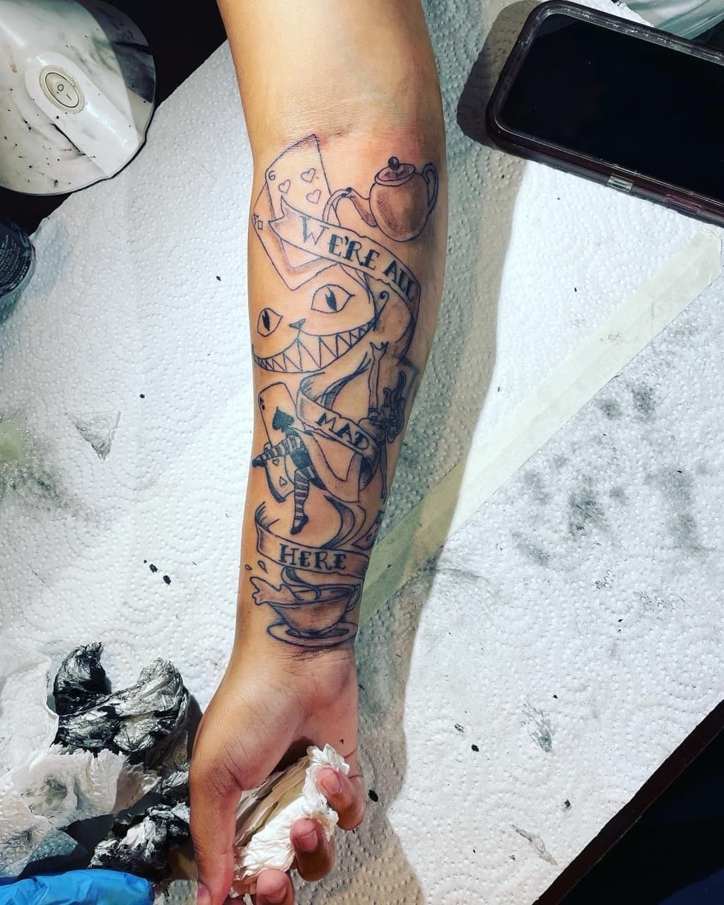 Line-work + Illustrative cheshire cat tattoo on Forearm by 4oeMag_Tattoos on TattMe