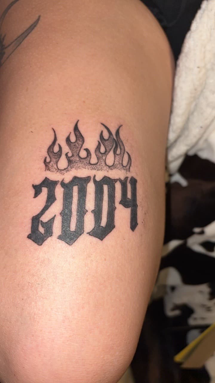 Lettering + Black-work numbers tattoo on Upper Arm by The_plug_Tattoo._Co on TattMe