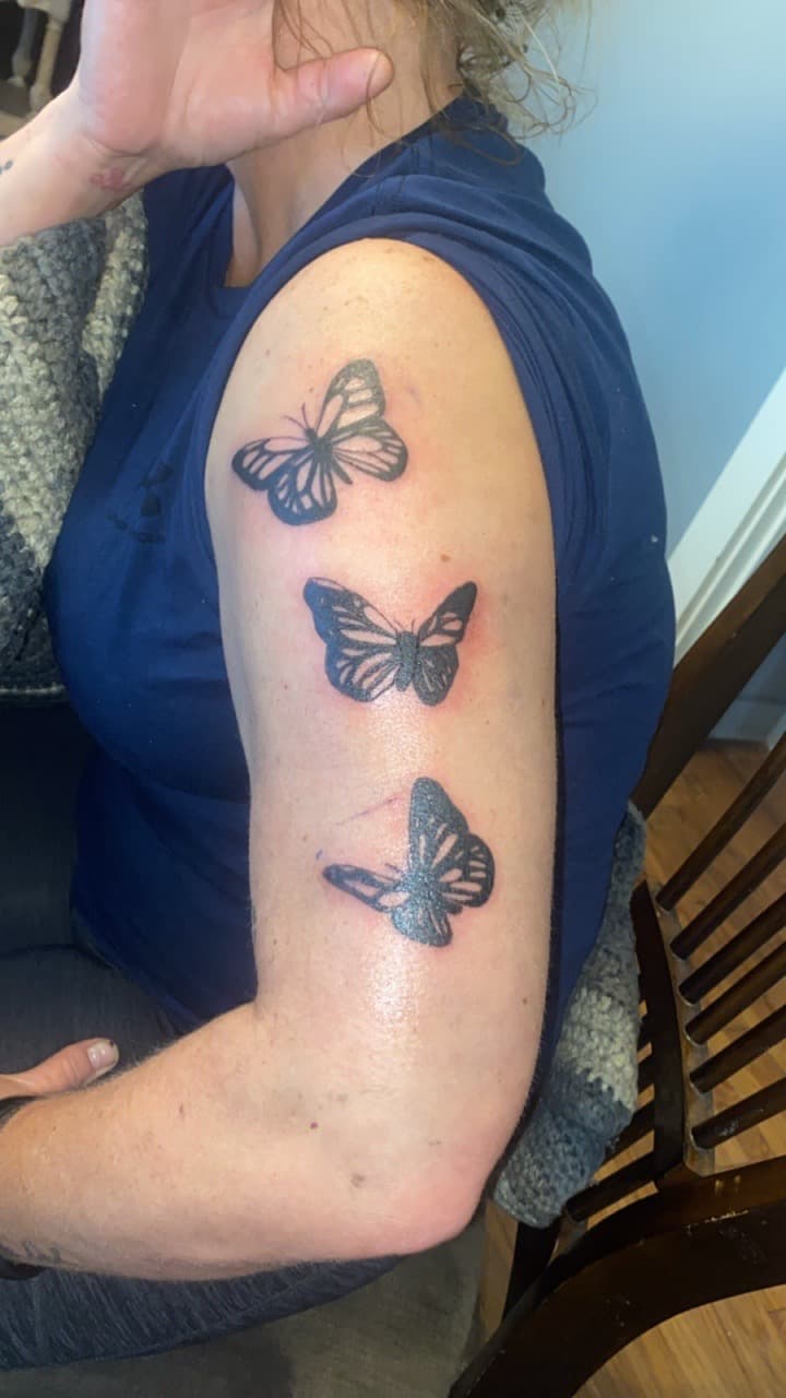Black-work + Illustrative butterflies tattoo on Upper Arm by The_plug_Tattoo._Co on TattMe