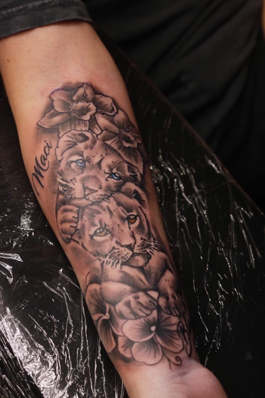 Black & Grey + Realism lionesses tattoo on Forearm by TNO_INK on TattMe