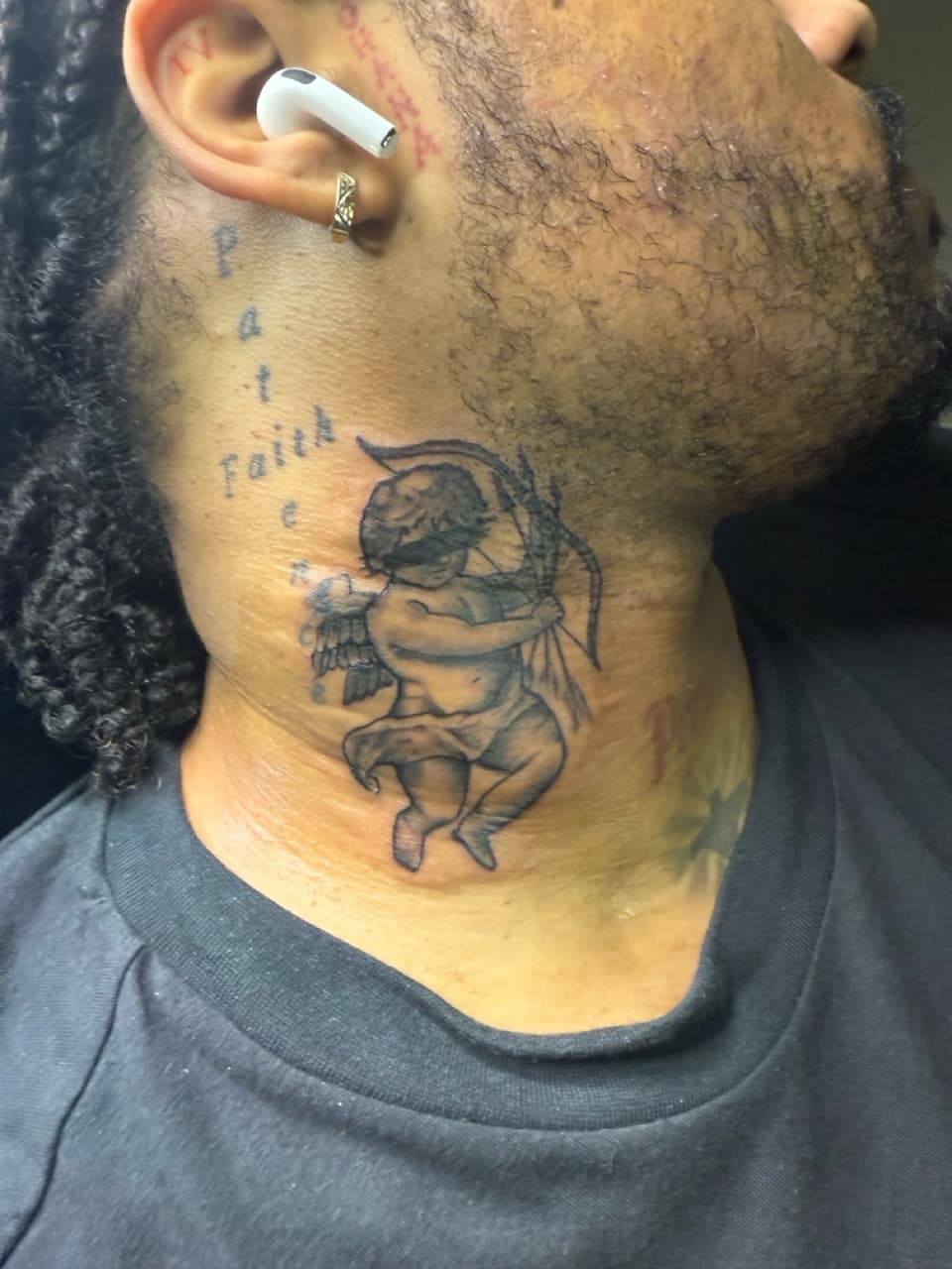 Black & Grey + Illustrative cupid tattoo on Neck (Side) by TNO_INK on TattMe
