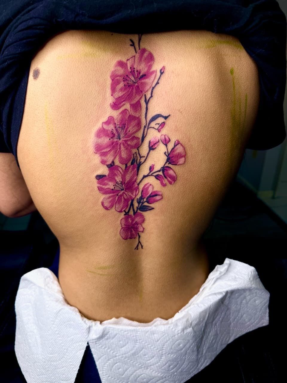 Floral + Color flowers tattoo on Spine by TNO_INK on TattMe
