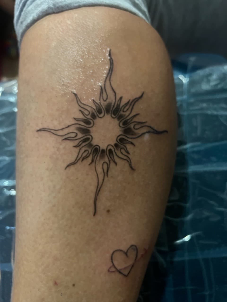 Fine Line + Minimalist sun tattoo on Upper Arm by Gifted_Artist on TattMe