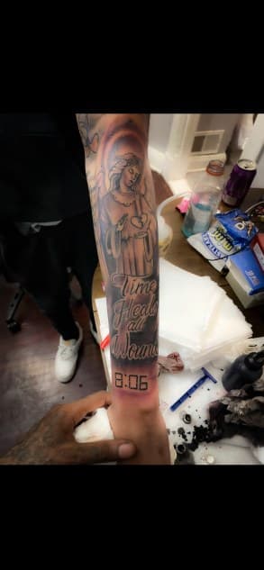 Black & Grey + Lettering angel tattoo on Forearm by Torian_Benns on TattMe