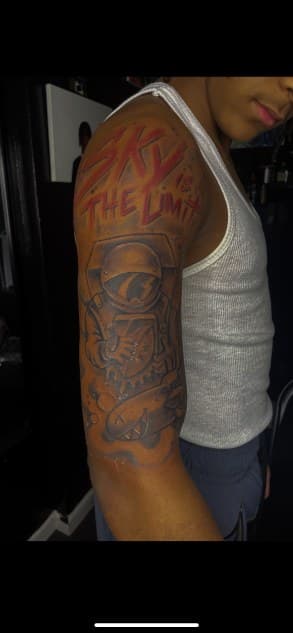 Illustrative + New School astronaut tattoo on Upper Arm by Torian_Benns on TattMe