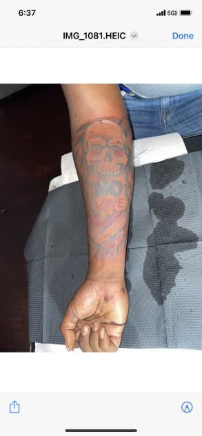 Black & Grey + Lettering skull tattoo on Forearm by Torian_Benns on TattMe