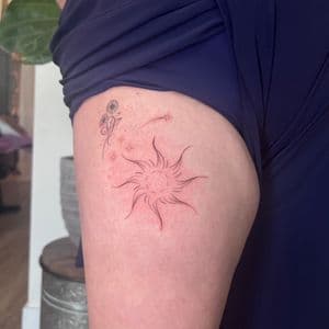 Fine Line sun tattoo on Thigh by cozinks on TattMe