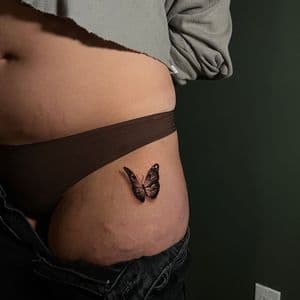 Black & Grey Butterfly tattoo on Hip by cozinks on TattMe