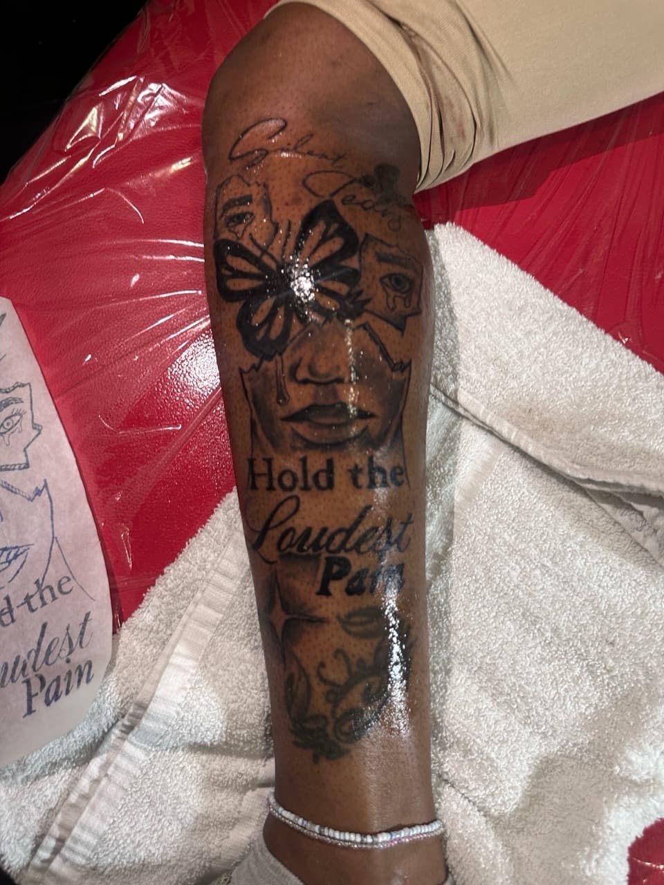 Black & Grey + Lettering butterfly tattoo on Calf by RoxkTouch on TattMe