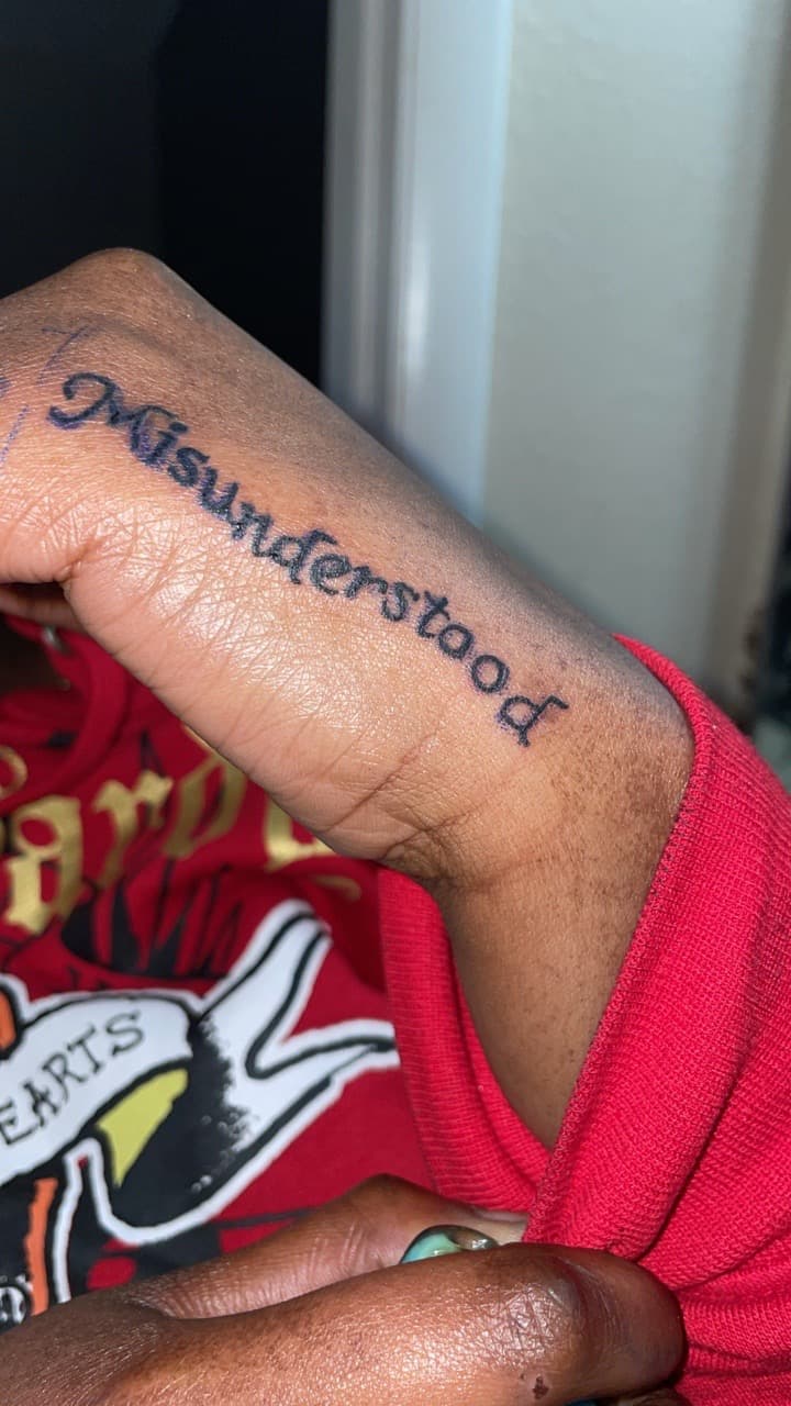 Lettering + Script misunderstood tattoo on Hand by Syd_tattoos on TattMe