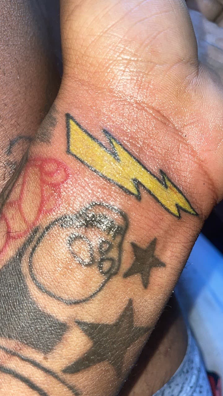 Color + Cartoon lightning bolt tattoo on Wrist by Syd_tattoos on TattMe