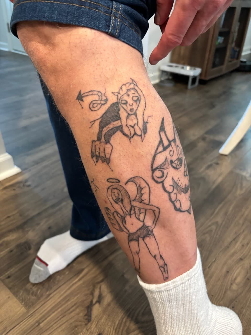 Line-work + Black-work figures tattoo on Calf by Cuban_Connection_Tattoo on TattMe
