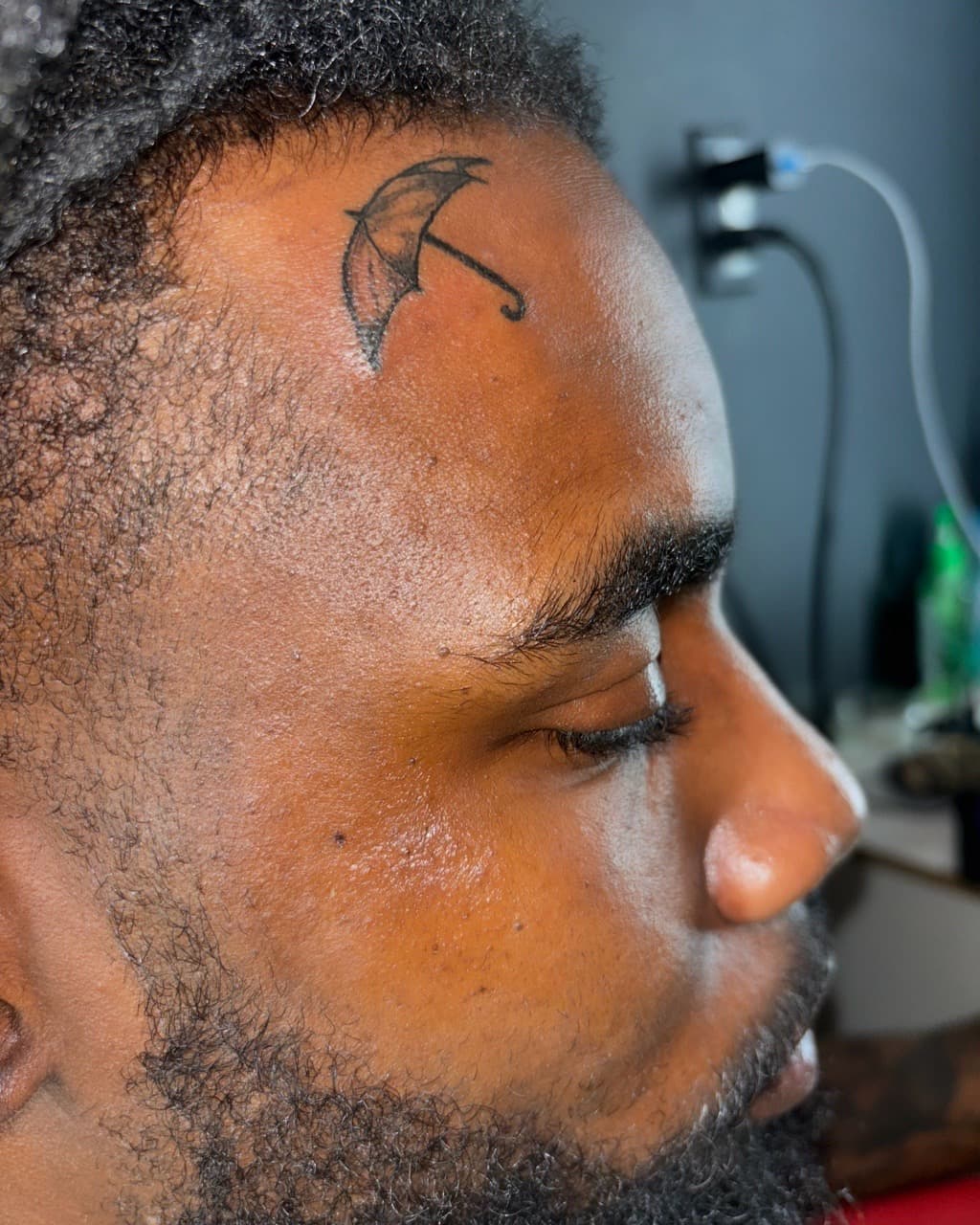 Fine Line + Minimalist umbrella tattoo on Forehead by Mona_Lisa on TattMe