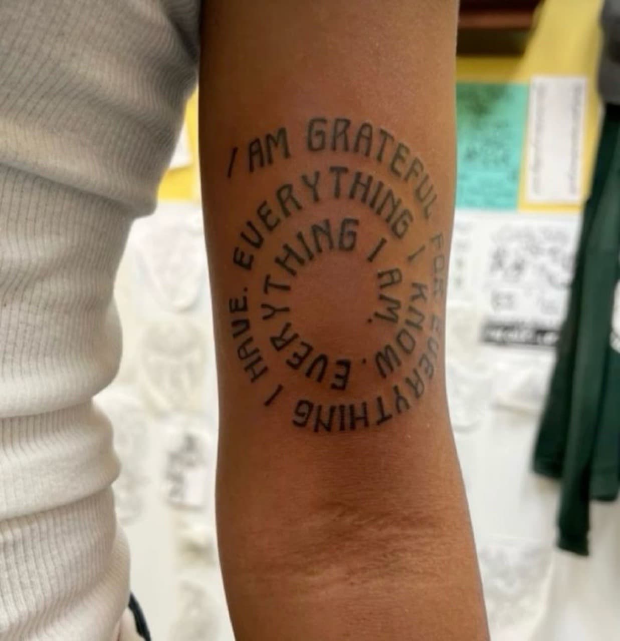 Lettering + Fine Line quote tattoo on Upper Arm by Mona_Lisa on TattMe