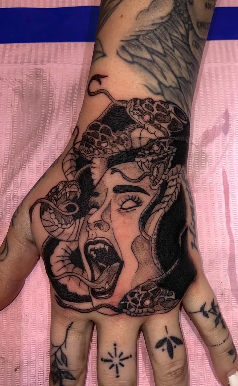 Black & Grey + Illustrative medusa tattoo on Hand by Zoe_Bates on TattMe