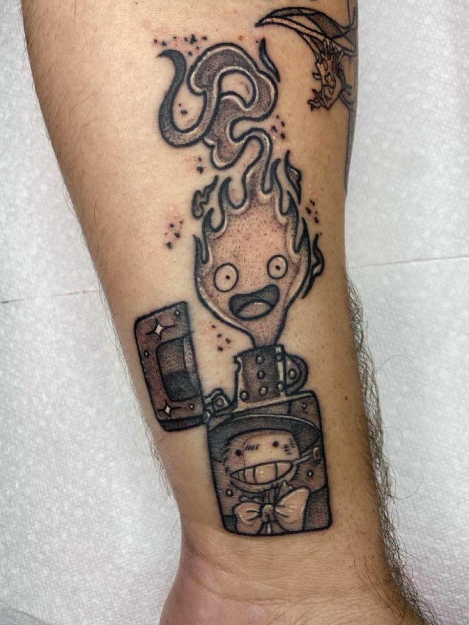 Black & Grey + Illustrative calcifer tattoo on Forearm by Zoe_Bates on TattMe