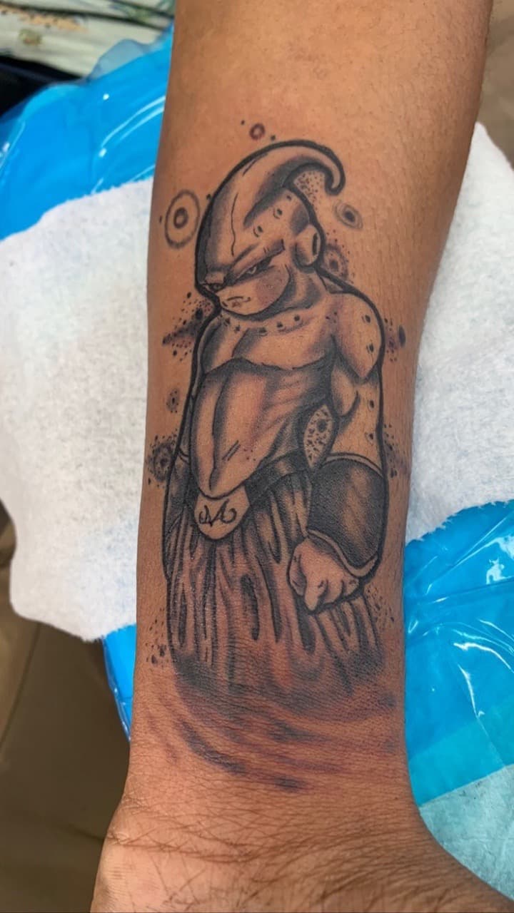 Black & Grey + Anime buu tattoo on Forearm by Modest_Ink_Ellz on TattMe