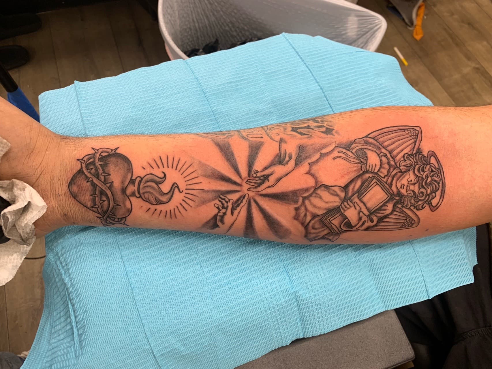 Black & Grey + Religious angel tattoo on Forearm by Modest_Ink_Ellz on TattMe