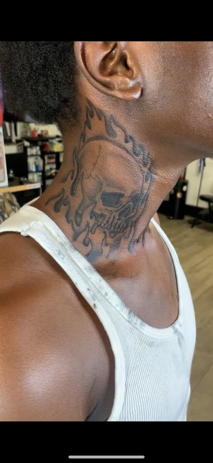 Black & Grey + Illustrative skull tattoo on Neck (Side) by Modest_Ink_Ellz on TattMe