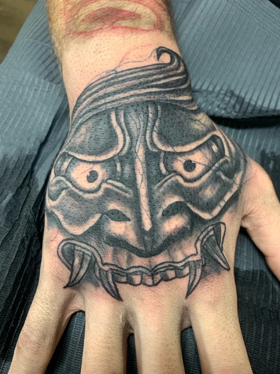 Black & Grey + Abstract skull tattoo on Hand by Modest_Ink_Ellz on TattMe